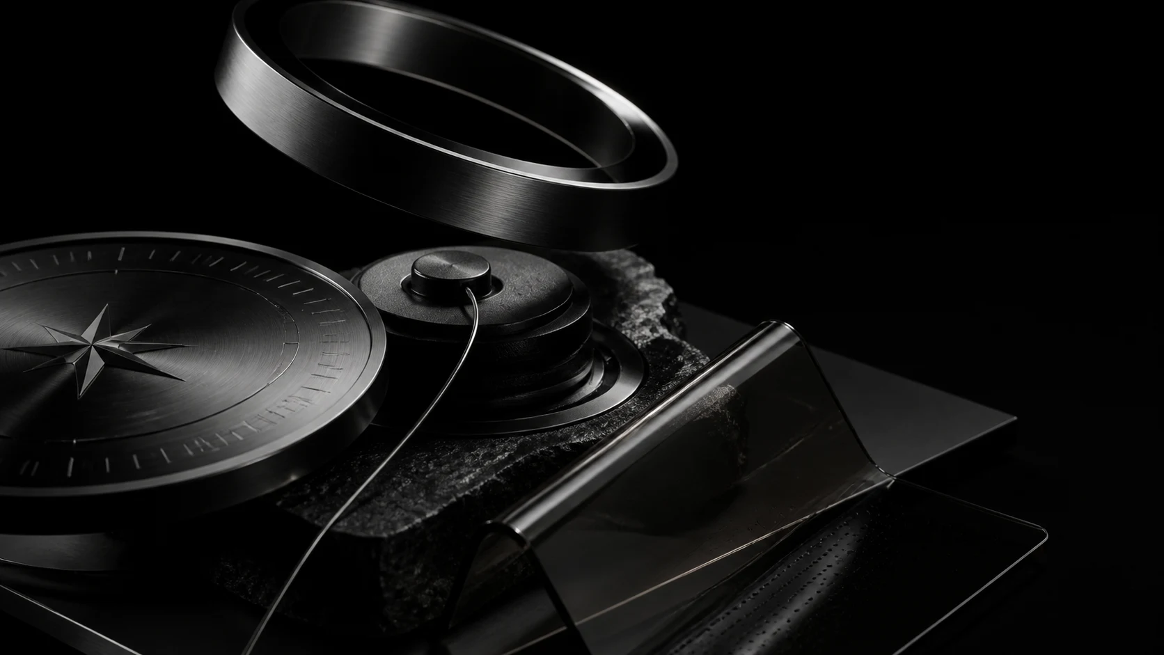A precision toolkit of chrome, glass, and black studio artifacts.